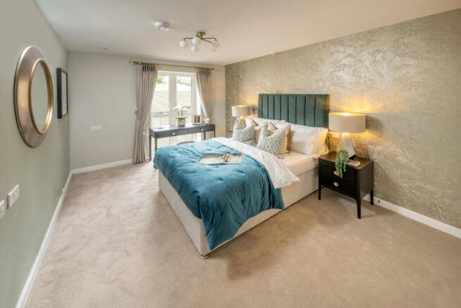 a bedroom with a large bed