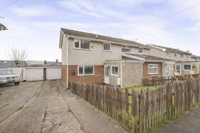 Suburban house with weathered fence.png