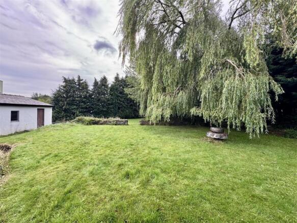 GARDENS, DOUBLE GARAGE AND DRIVEWAYS