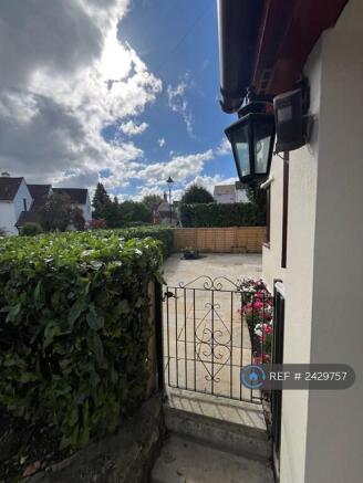 View To Enclosed Front Patio Garden