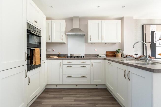 Good sized kitchen area with breakfast bar