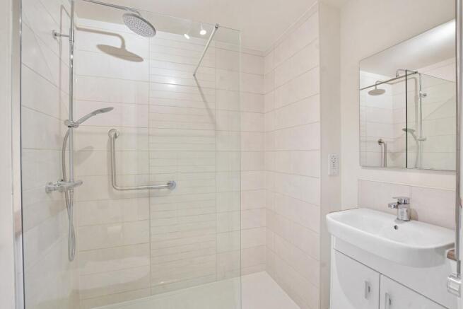 a bathroom with a glass shower