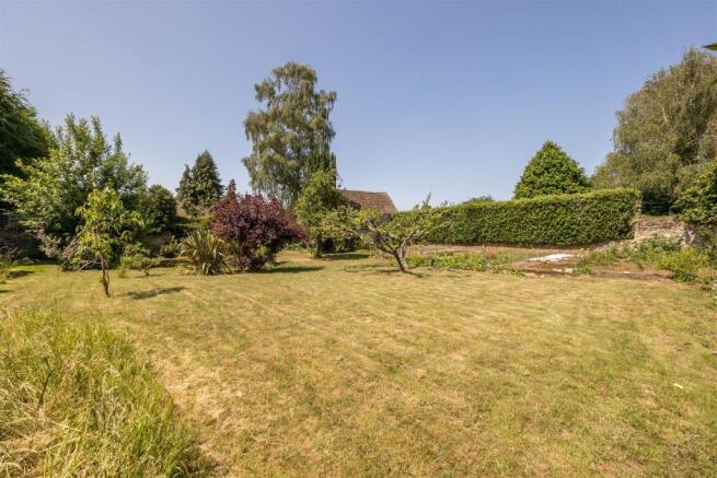 Large, peaceful gardens to rear