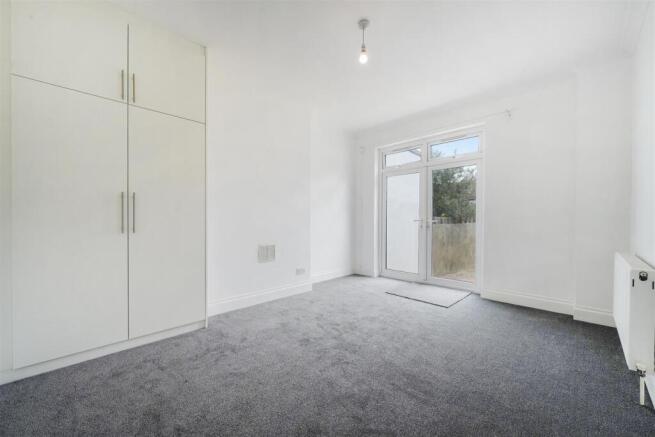 French doors to grarden from bedroom/dining room