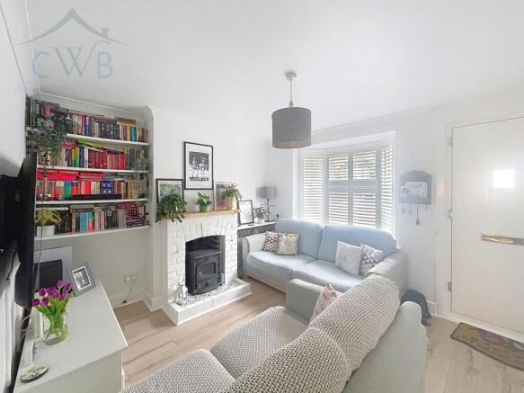 Sitting Rom with Bay Window & Fireplace