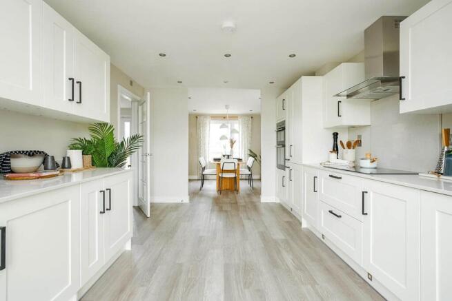 The open plan kitchen and dining area makes entertaining easy