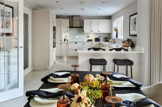 A breakfast bar and space for a dining area creates sociable mealtimes in the Rightford
