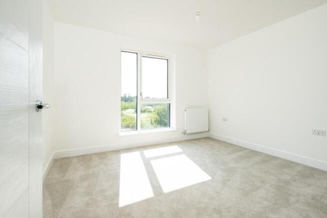 A bright bedroom to furnish as you please