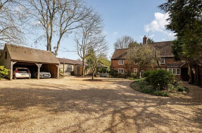 April Cottage, showing double car port, shed & gazebo