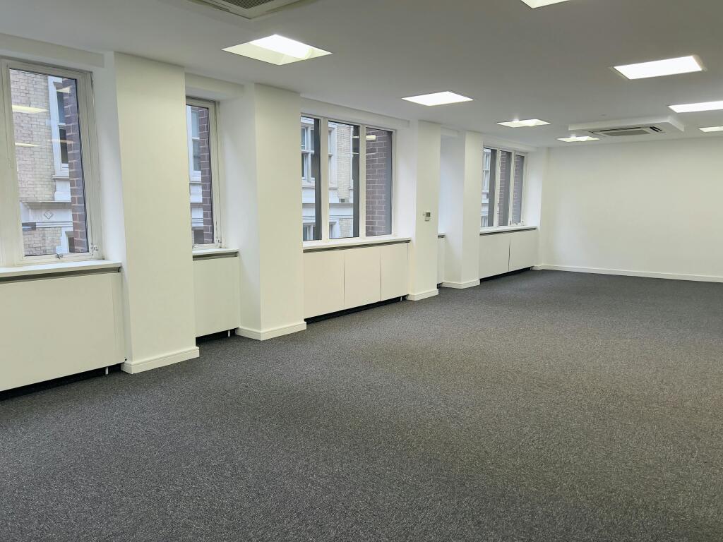 30-31 Furnival 1st Floor  Spacious Modern Office With Large Windows And Carpeting 1.jpg