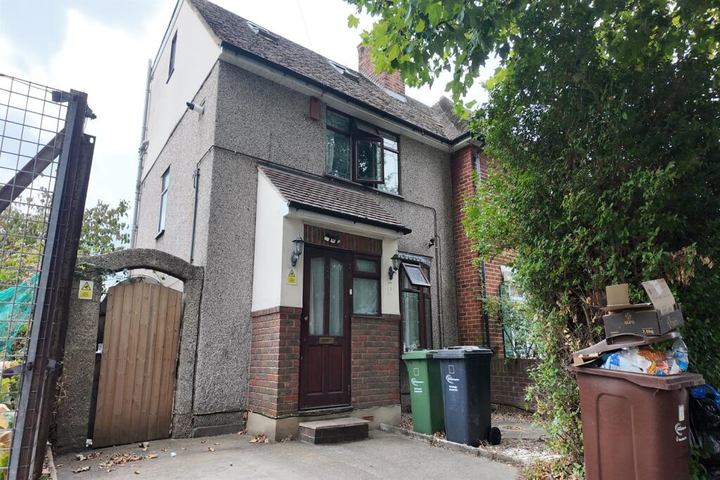 Main image of property: Wood Lane, RM8