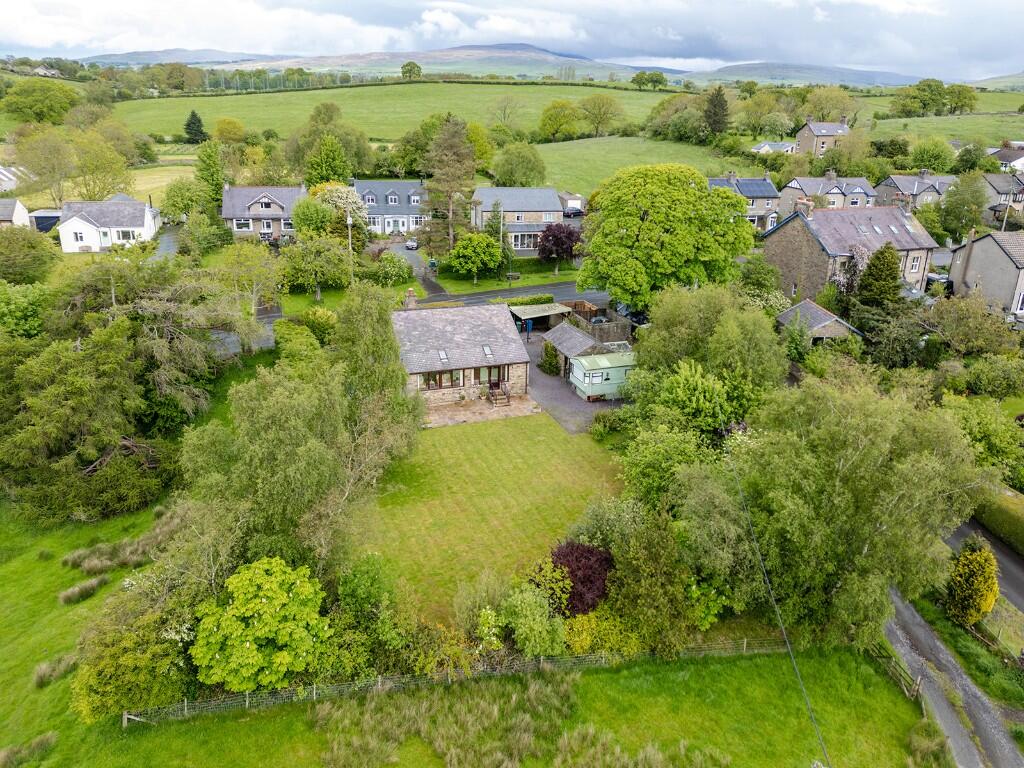 Main image of property: Springfield, With Planning Permission for Two 3 Bed, Detached Houses, to the Rear , High Bentham, LA2