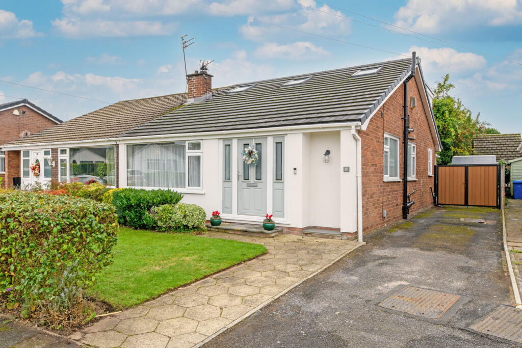 Main image of property: Howard Avenue, Lymm, WA13 9EQ