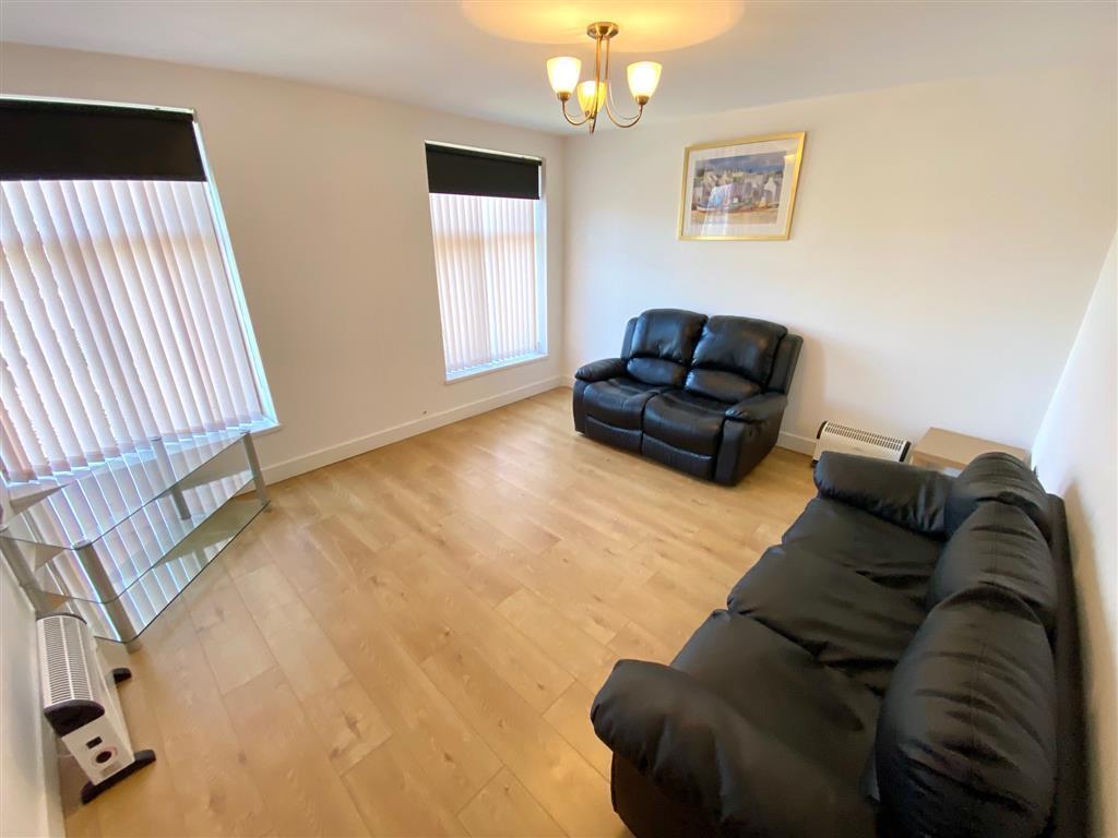 Main image of property: 1a Bay Hall Common Road, HUDDERSFIELD