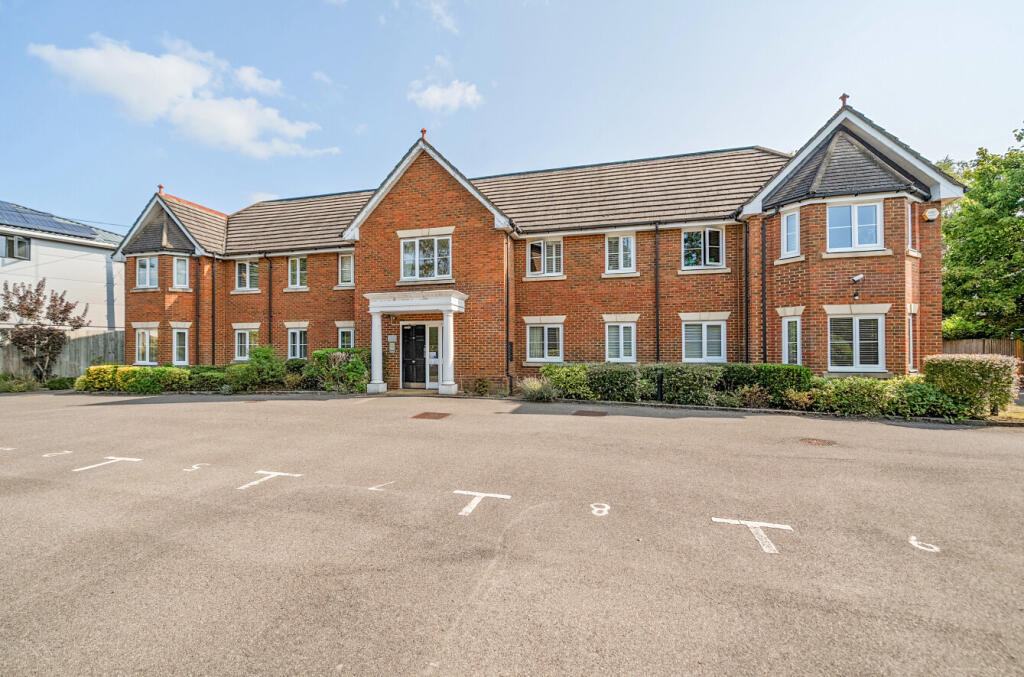 Main image of property: Searlewood Court, 143 Guildford Road, Woking, Surrey, GU24