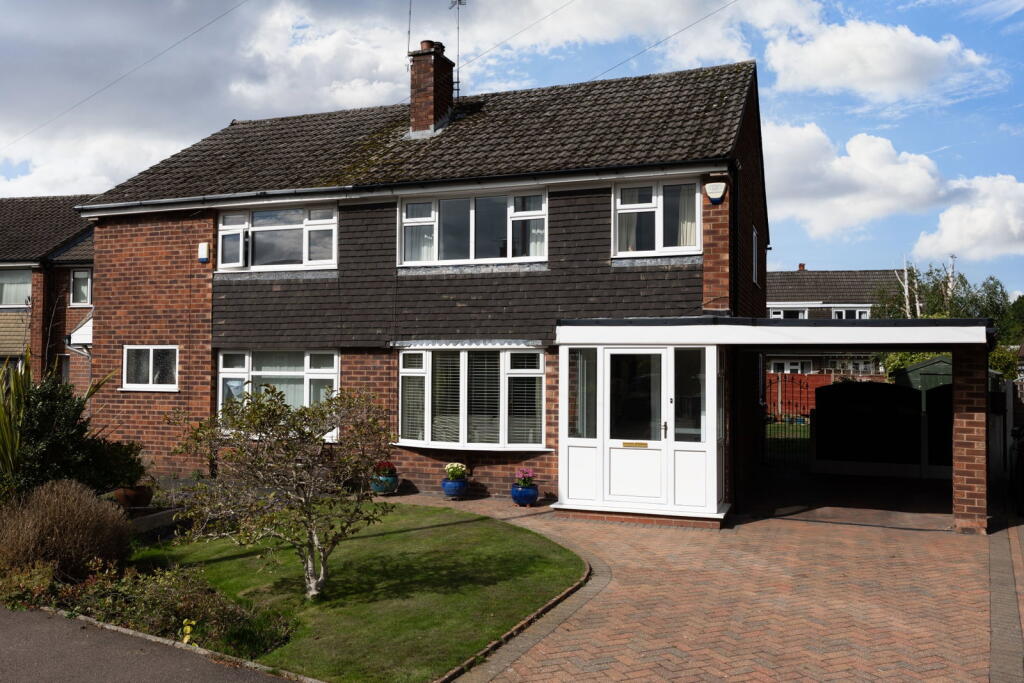 Main image of property: Harlech Drive, Hazel Grove, Stockport SK7 5NA