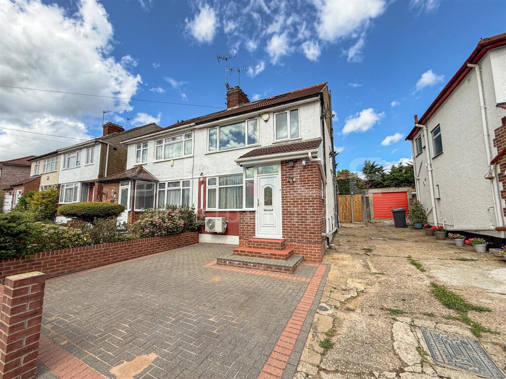 Main image of property: Extended Family Home with Loft Conversion