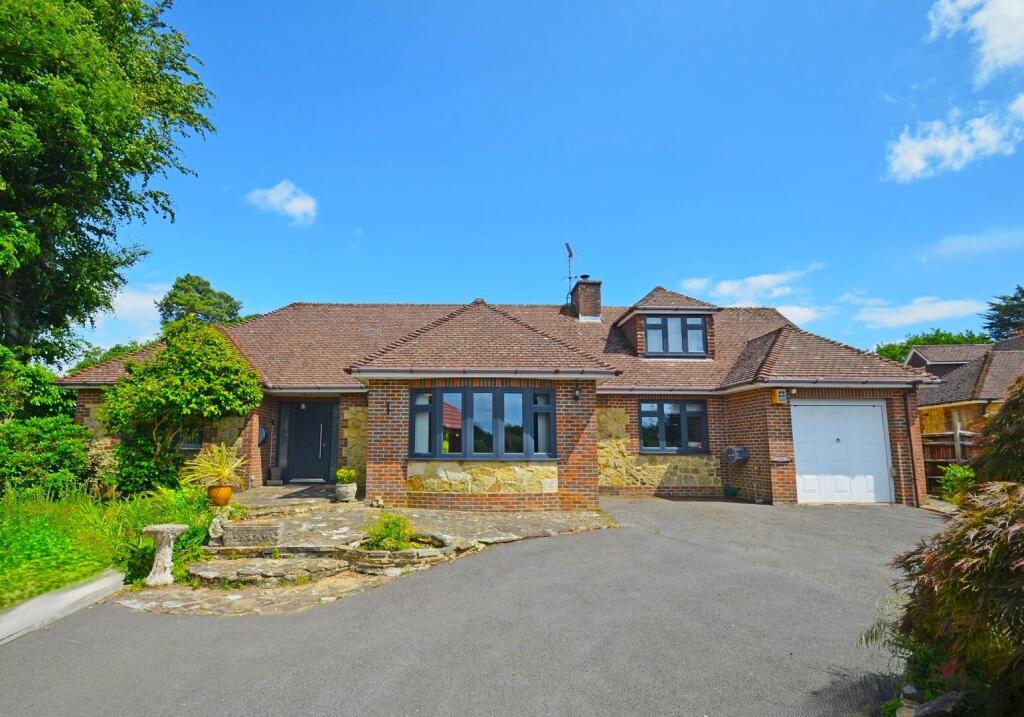 Main image of property: Woodpecker Lane, Storrington, RH20