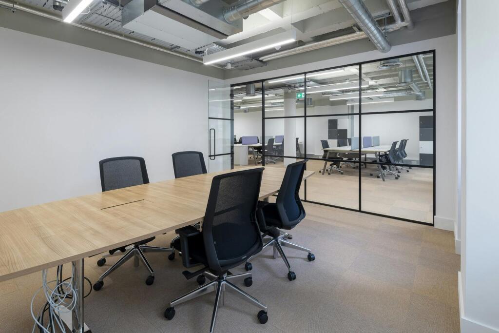 30-31 Furnival Street  Modern Conference Room With Glass Partitions And Office Chairs.jpg