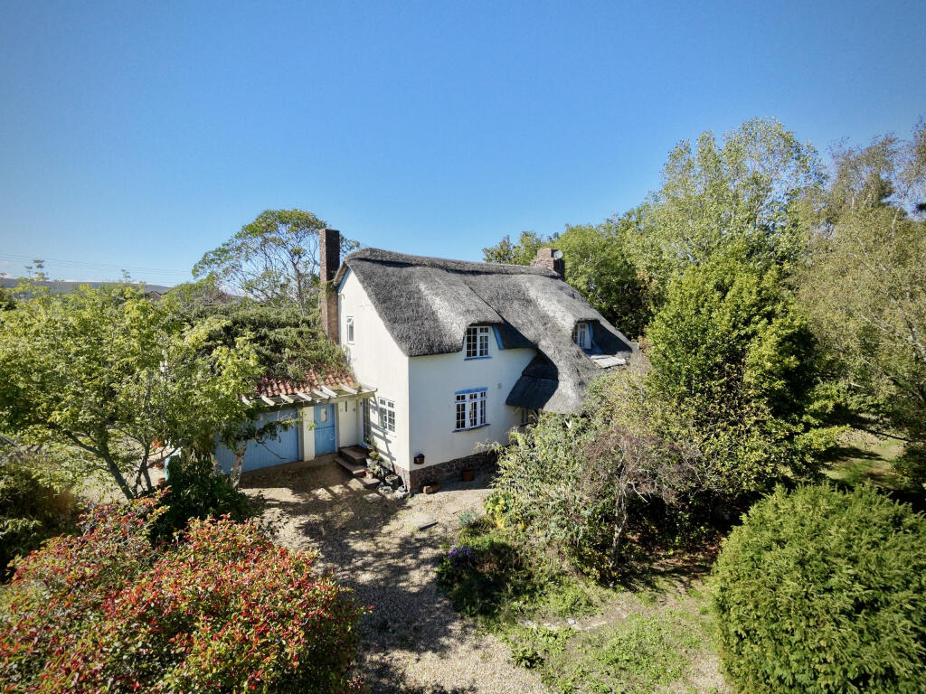 Main image of property: IDYLLIC THATCHED COTTAGE IN APPROXIMATELY ¾ OF AN ACRE - Hilltop Lane, Kilve, Somerset