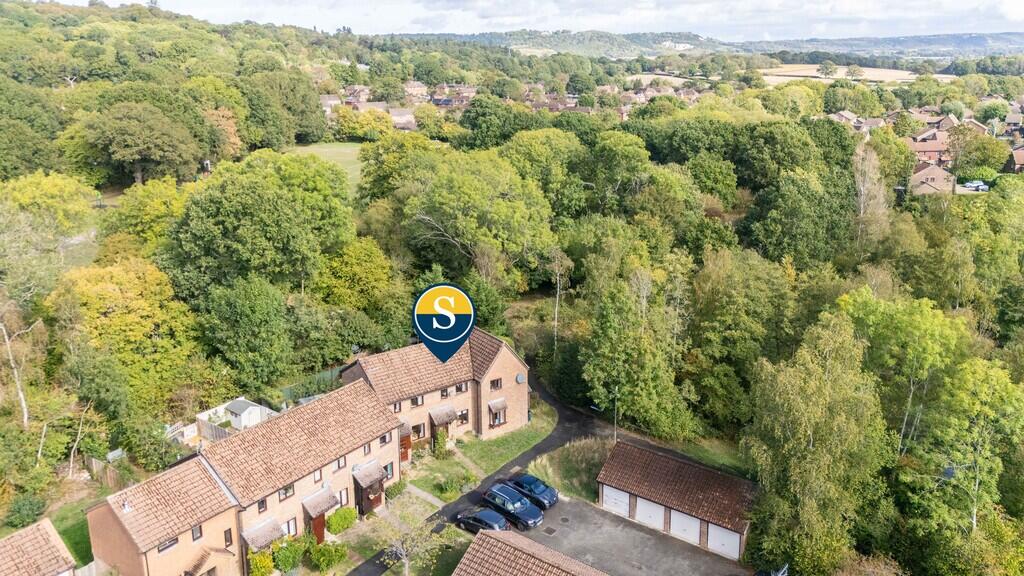 Main image of property: Treelands, North Holmwood