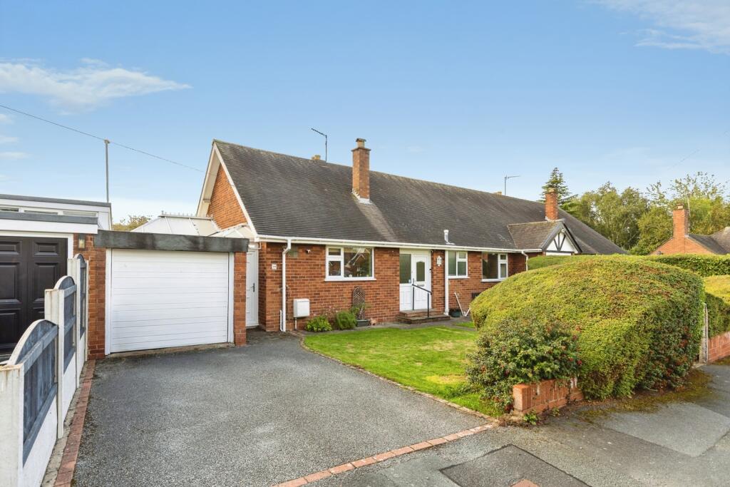 Main image of property: Hollyfield, Gresford, Wrexham, LL12