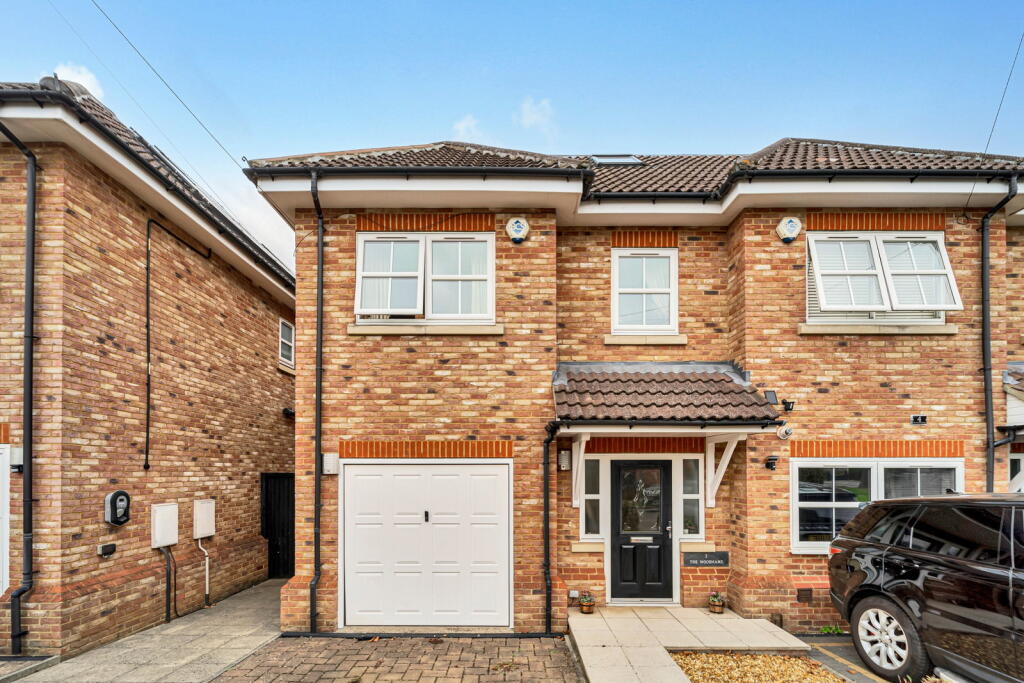 Main image of property: Grange Road, New Haw, KT15