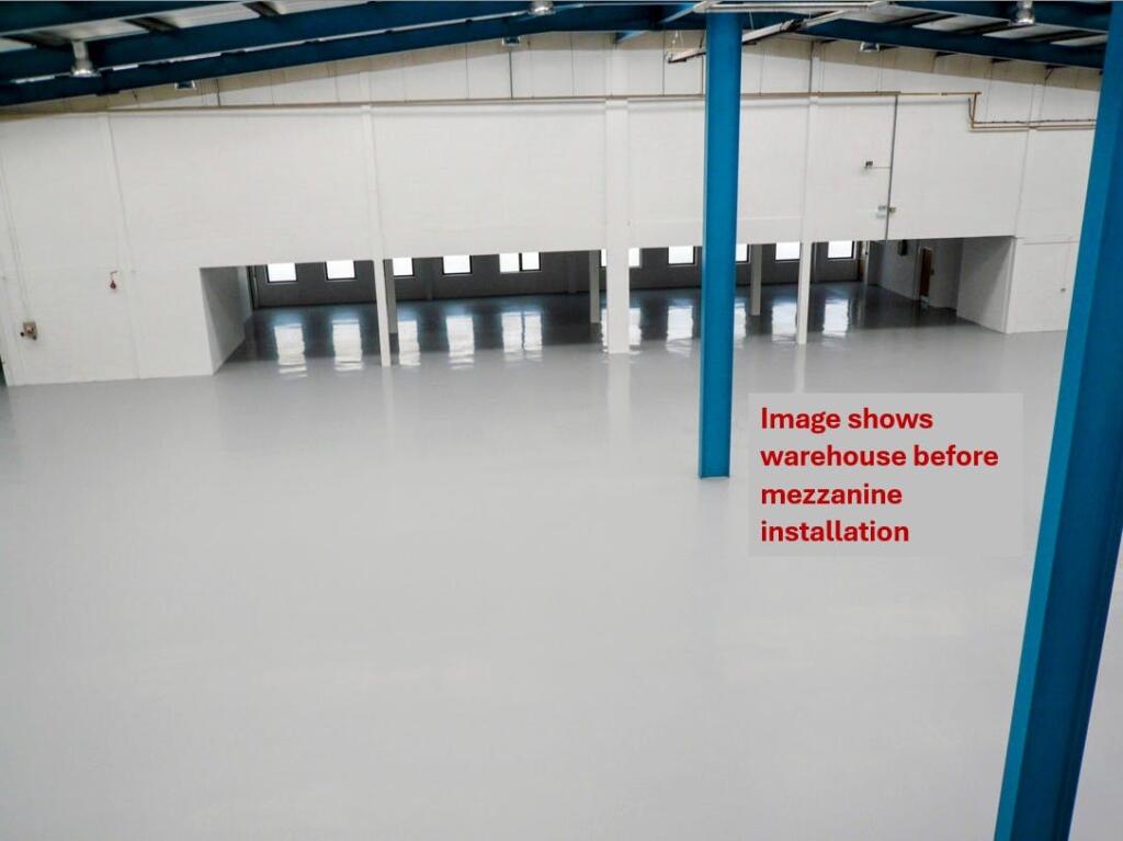 Unit 5, Alpha Way, Egham, internal warehouse historical from height- pre-mezz older image.jpg