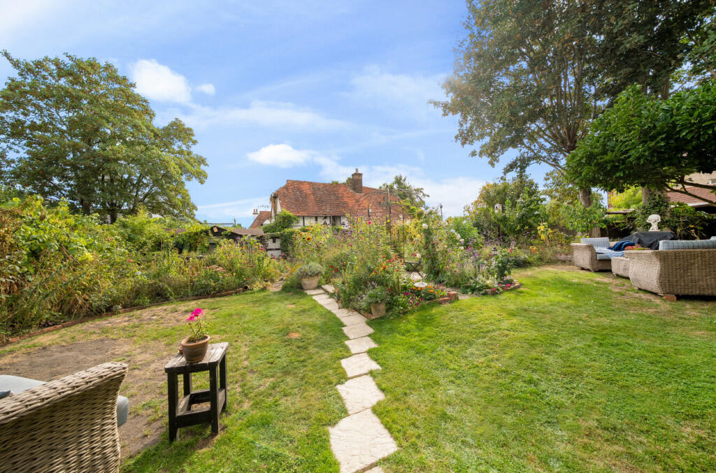 Main image of property: High Street, Old Woking, Woking, Surrey, GU22