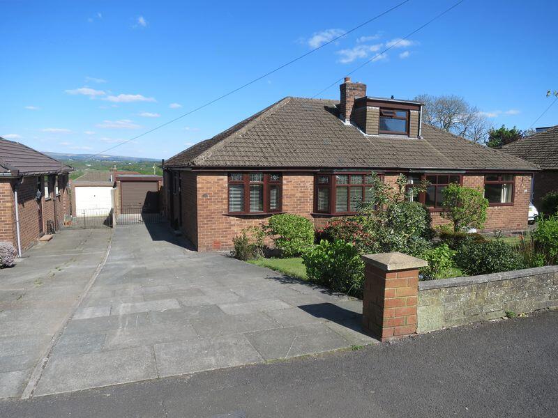 Main image of property: 21 Ashfield Park Drive, Standish, WN6 0EG