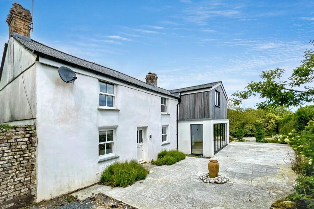 Main image of property: Carnon Downs