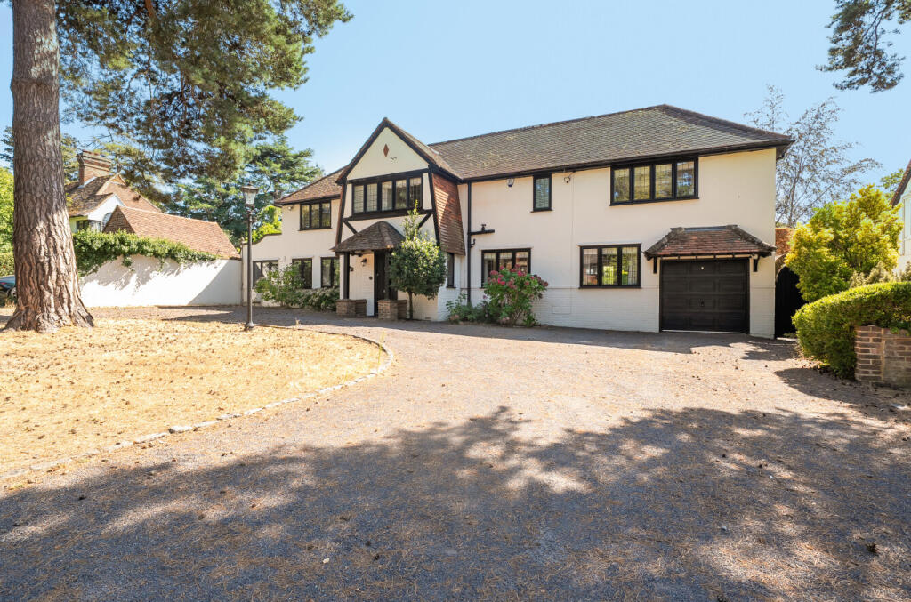 Main image of property: Hook Heath Avenue, Woking, Surrey
