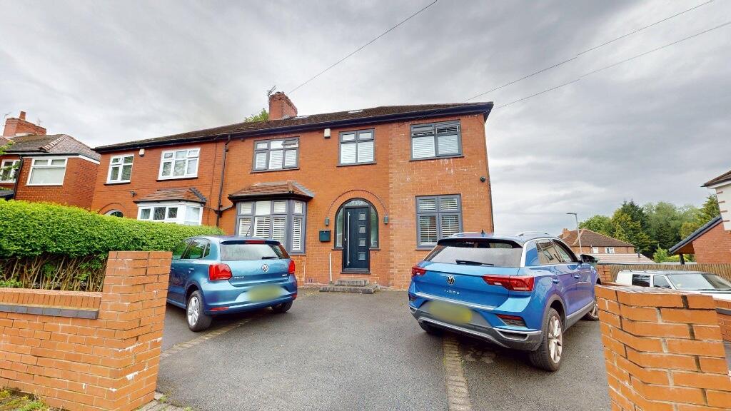Main image of property: 107 Crow Hill South, M24 1LA