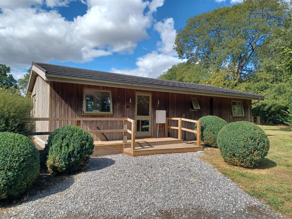 Main image of property: Longbarrow Lodge