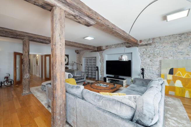 Exposed Stone Walls & Original Warehouse Beams