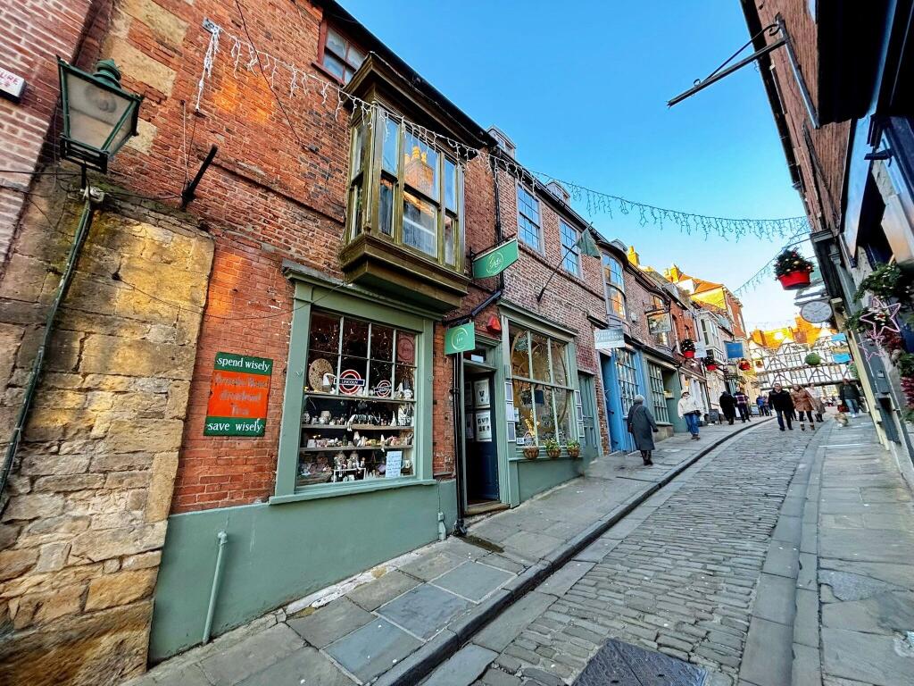 Main image of property: Gigi's Bar & Bistro & Gift Shop, 26-27 Steep Hill, Lincoln, LN2 1LU