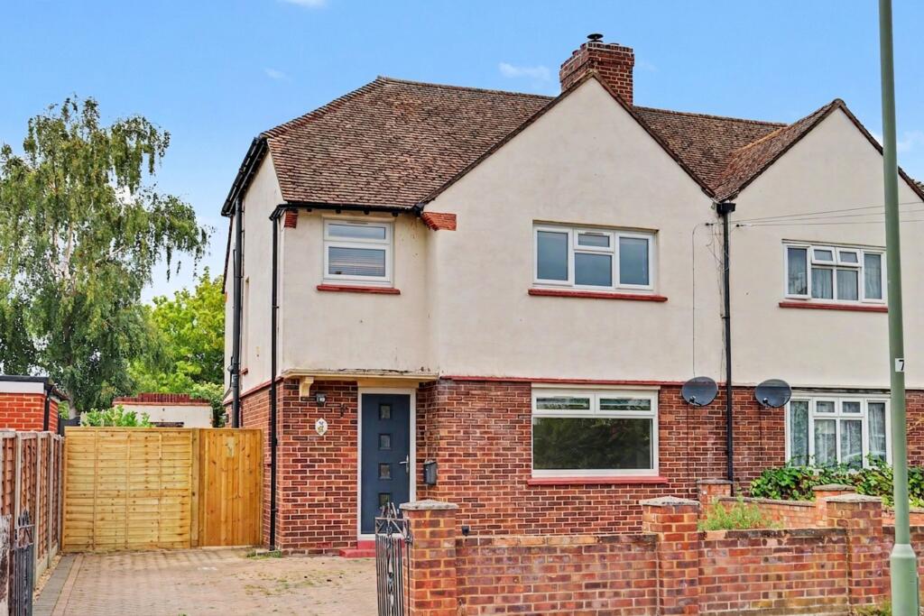 Main image of property: Mead Road, Hersham, KT12