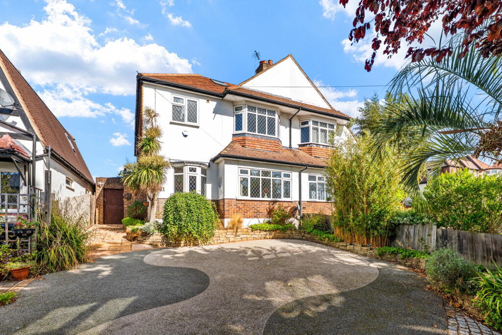 Main image of property: The Glade, Stoneleigh, Surrey, KT17 2HW