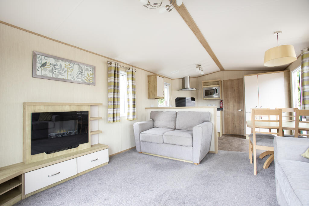 Main image of property: ABI Alderley, Golden Cap Holiday Park, Chideock, Seatown, Dorset, DT6 6JX