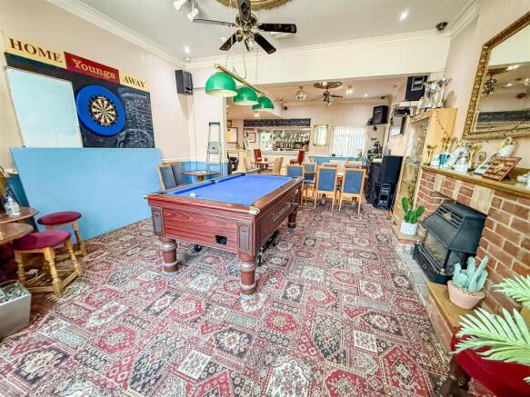 ALTERNATE VIEW OF BAR & SOCIAL CLUB AREA
