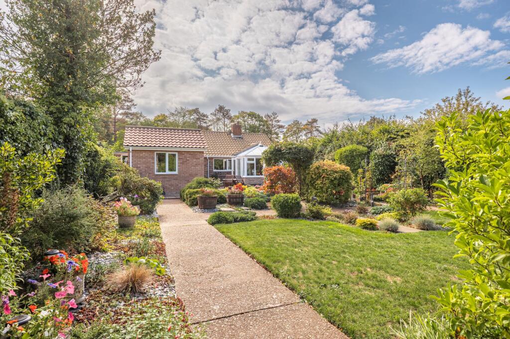 Main image of property: Well Presented Bungalow Close to the Centre of Holt