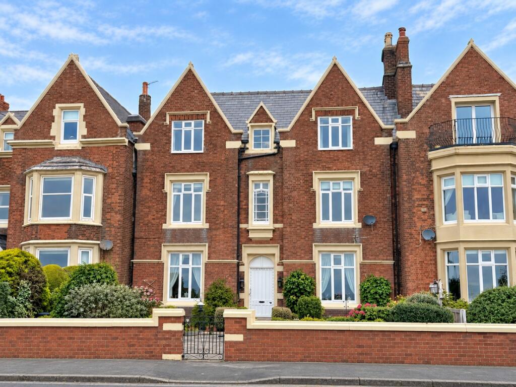 Main image of property: Top Floor, East Beach 