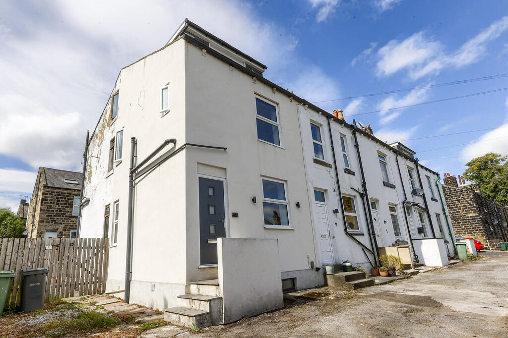 Main image of property: Wells Terrace, Guiseley, Leeds ~ END TERRACE over FOUR floors with GARAGE and GRASS area ~