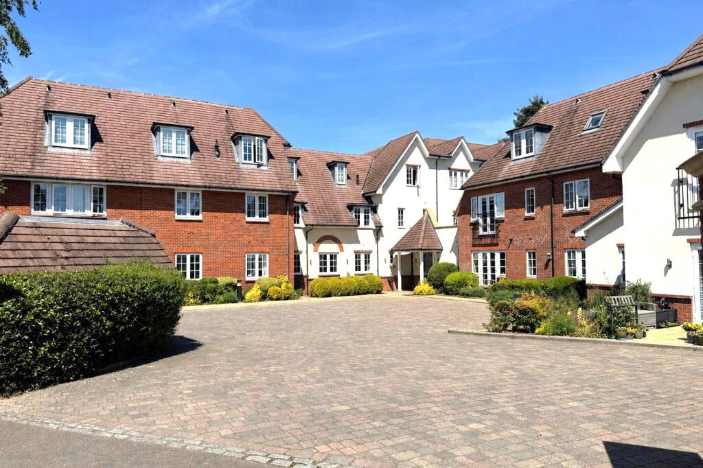 Main image of property: Between Streets, Cobham, Surrey, KT11