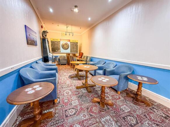 ALTERNATE VIEW OF BAR & SOCIAL CLUB AREA