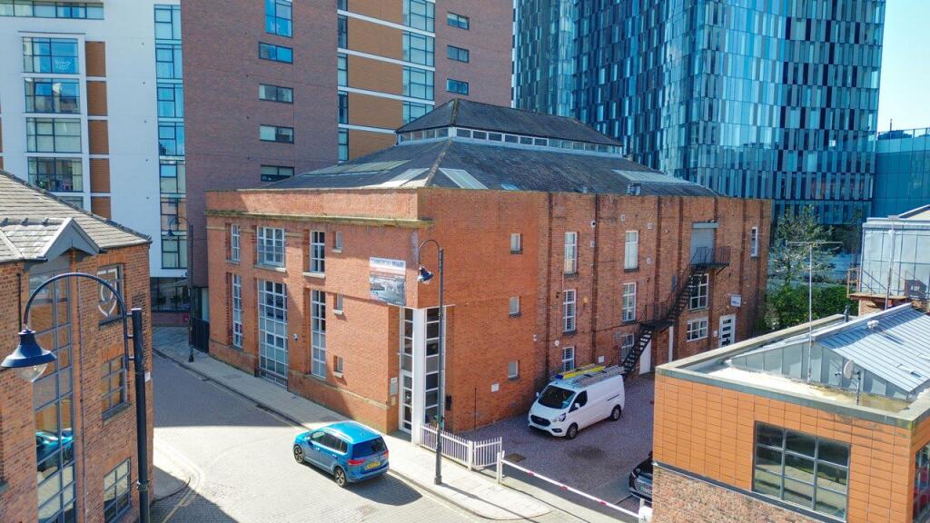 Main image of property: Commercial Wharf, 6 Commercial Street, Manchester, M15 4PZ
