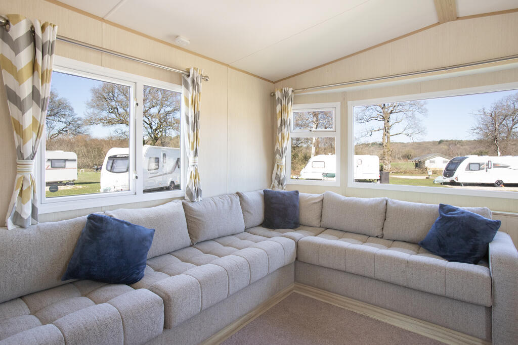 Main image of property: ABI Summer Breeze Deluxe, Sandyholme Holiday Park, Owermoigne, Dorchester, Dorset, DT2 8HZ