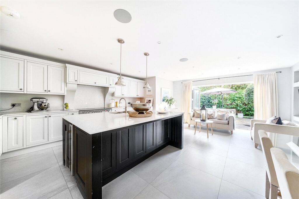 Main image of property: Warrens End, Rowtown, Addlestone, KT15