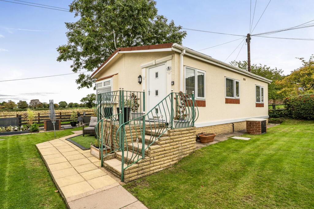 Main image of property: Woodhouses Park, Chester Road, Frodsham, Cheshire, WA6 6XP