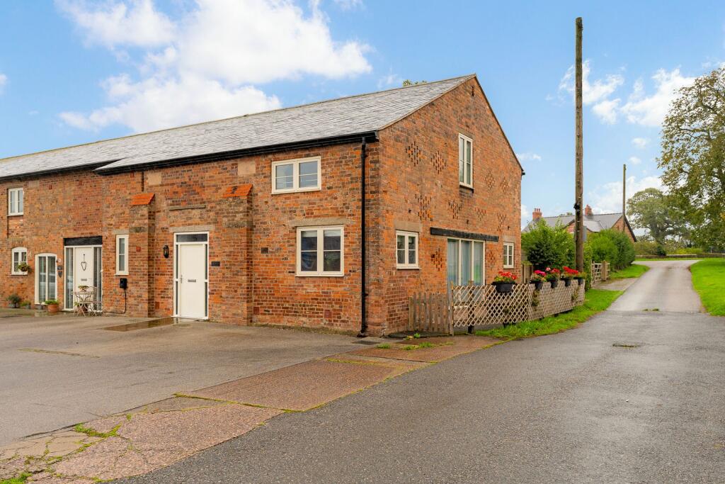 Main image of property: Hampton House  - Four bedroom barn conversion with additional land